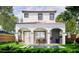 Serene backyard boasting a covered veranda, outdoor seating, cooking area, and a refreshing swimming pool at 1473 Berkshire Ave, Winter Park, FL 32789
