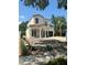 Two story house with balcony and two car garage in pre-landscaping construction at 1473 Berkshire Ave, Winter Park, FL 32789