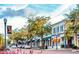 Charming street view of a city neighborhood with mature trees and boutique shops in a desirable location at 1473 Berkshire Ave, Winter Park, FL 32789