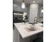 Kitchen island with white marble countertop, stainless steel appliances, and gold accents at 1526 Hempel Ave, Gotha, FL 34734