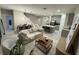Bright, open floor plan combines the kitchen, living, and dining areas for seamless entertaining at 1526 Hempel Ave, Gotha, FL 34734