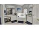 Large bathroom offering tub, shower, dual vanity, and beach themed decor at 1709 Kinsman Way, Lakeland, FL 33809