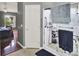 En-suite bathroom offers a walk-in shower with safety bars and updated fixtures at 1709 Kinsman Way, Lakeland, FL 33809