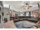 Spacious living room features a vaulted ceiling, fan, and comfortable seating, ideal for relaxation at 1709 Kinsman Way, Lakeland, FL 33809
