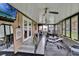 Fully equipped workout room with ceiling fans and windows offering natural light at 1709 Kinsman Way, Lakeland, FL 33809