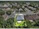 Aerial view of home showcasing the backyard and surrounding neighborhood at 1712 Riveredge Rd, Oviedo, FL 32766