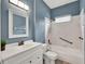 Bathroom features a vanity, mirror, toilet, tub, and shower at 1712 Riveredge Rd, Oviedo, FL 32766
