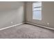 Empty bedroom featuring a neutral-colored carpet and a window at 1712 Riveredge Rd, Oviedo, FL 32766