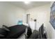 This bedroom offers a clean design with a gaming setup, comfortable bed, and ample storage space at 17504 Butterfly Pea Ct, Clermont, FL 34714