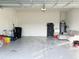 A spacious two-car garage, perfect for storage and hobbies at 17504 Butterfly Pea Ct, Clermont, FL 34714