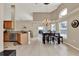 Bright kitchen and dining area offering modern appliances and lots of natural light at 211 Tavestock Loop, Winter Springs, FL 32708