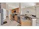 Well-equipped kitchen featuring granite countertops and stainless steel appliances at 211 Tavestock Loop, Winter Springs, FL 32708