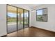Bright dining area with glass sliding doors leading to a screened patio at 212 Lugano Way, Debary, FL 32713