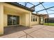 Covered outdoor patio with brick flooring and a great view of the backyard at 212 Lugano Way, Debary, FL 32713