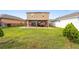 Large backyard featuring a gazebo and patio area for outdoor entertainment and relaxation at 2254 Canyon Breeze Ave, Kissimmee, FL 34746