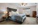 Bedroom featuring a plush upholstered headboard, and window bench, creating a relaxing atmosphere at 2921 Lake Tohopekaliga Blvd, Kissimmee, FL 34746