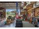 Garage interior with a view to the outside shows storage and workbench areas at 2921 Lake Tohopekaliga Blvd, Kissimmee, FL 34746