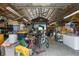 Spacious garage interior filled with equipment and offering ample storage solutions at 2921 Lake Tohopekaliga Blvd, Kissimmee, FL 34746