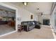 Comfortable living room open to the kitchen with a tiled floor at 2921 Lake Tohopekaliga Blvd, Kissimmee, FL 34746