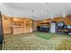 Recreation room featuring bar, golf net, and aquarium, offering entertainment and relaxation at 2921 Lake Tohopekaliga Blvd, Kissimmee, FL 34746