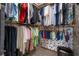 Spacious walk-in closet features multiple rods and shelves for optimal storage at 2921 Lake Tohopekaliga Blvd, Kissimmee, FL 34746