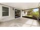 Screened patio with access to the backyard and pool area at 3015 Riviera Bay Ct, Oviedo, FL 32765
