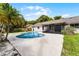 Backyard with a private pool and screened-in patio at 3015 Riviera Bay Ct, Oviedo, FL 32765
