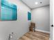 Unfinished storage room with tile flooring and bright blue accents at 3015 Riviera Bay Ct, Oviedo, FL 32765