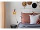 Intimate bedroom detail showcases unique décor, emphasizing comfort and style at 3061 Beach Palm Ave, Kissimmee, FL 34747