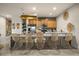 Well-lit kitchen features modern appliances, concrete countertops, and stylish decor at 3061 Beach Palm Ave, Kissimmee, FL 34747
