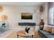 Bright living room features modern decor, open-concept design, and comfortable seating, adjacent to the dining area at 3061 Beach Palm Ave, Kissimmee, FL 34747