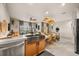 Spacious open floor plan with a kitchen, dining area, and living room at 3061 Beach Palm Ave, Kissimmee, FL 34747