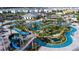 Resort-style community with lazy river, water slides, and lush landscaping perfect for families and relaxation at 3193 Pequod Pl, Kissimmee, FL 34746