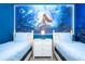 Themed bedroom with vibrant underwater mural, creating a magical space for children or guests at 3193 Pequod Pl, Kissimmee, FL 34746