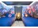 Themed bedroom featuring comic book superhero design, complete with coordinating bedding and decor at 3193 Pequod Pl, Kissimmee, FL 34746