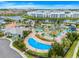 Aerial view of the neighborhood's resort-style pool area, which includes a splash pad and a tiki bar at 3193 Pequod Pl, Kissimmee, FL 34746