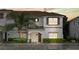 Charming two-story townhome with well-maintained landscaping and a welcoming front entrance at 3193 Pequod Pl, Kissimmee, FL 34746
