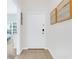 Hallway with tiled flooring leading to a bedroom at 3193 Pequod Pl, Kissimmee, FL 34746