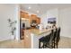 Kitchen with countertop bar, stainless steel appliances, and ample counter space at 3193 Pequod Pl, Kissimmee, FL 34746