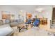 Open living area with kitchen, dining, and living spaces, ideal for modern living and entertaining at 3193 Pequod Pl, Kissimmee, FL 34746