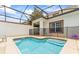 Private backyard pool with safety fence, perfect for relaxation and entertainment in a secure environment at 3193 Pequod Pl, Kissimmee, FL 34746