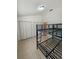 Bright bedroom with three closets and a bunk bed frame at 32645 Red Oak Dr, Eustis, FL 32736