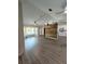 Open living space featuring a bay window, and a accent wall at 32645 Red Oak Dr, Eustis, FL 32736