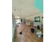Spacious enclosed patio with tile flooring, creating a versatile outdoor space at 32645 Red Oak Dr, Eustis, FL 32736
