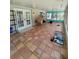 Spacious enclosed patio with tile flooring, creating a versatile outdoor space at 32645 Red Oak Dr, Eustis, FL 32736