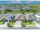 Stunning aerial view showcasing the home's layout, neighboring houses, and lush greenery in a peaceful setting at 3454 Somerset Park Dr # 36, Orlando, FL 32824