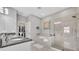 Bathroom featuring granite countertop, walk-in closet, soaking tub and glass-enclosed shower at 3454 Somerset Park Dr # 36, Orlando, FL 32824