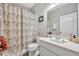Bathroom featuring a shower with a floral curtain and vanity with a sink at 3454 Somerset Park Dr # 36, Orlando, FL 32824