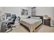 Modern bedroom featuring a work station and comfortable queen bed at 3454 Somerset Park Dr # 36, Orlando, FL 32824