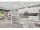 Bright kitchen with an island, modern lighting, and stainless steel appliances at 3454 Somerset Park Dr # 36, Orlando, FL 32824